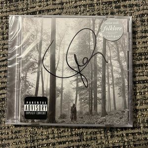 Signed Folklore. Unopened.